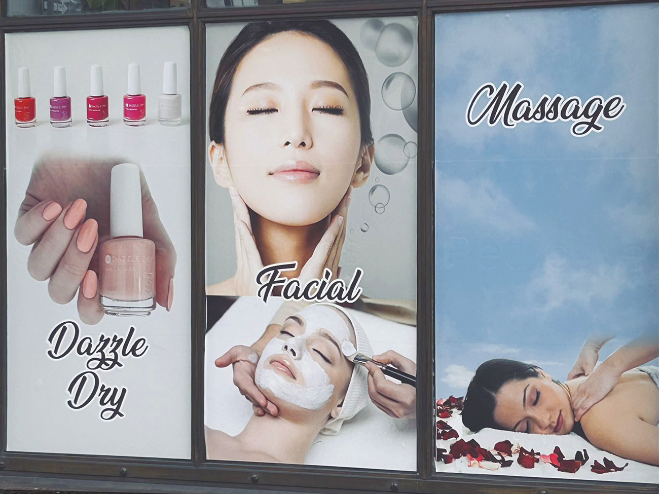 Out door Manicure, Facial and Massage poster in the window